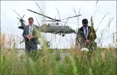  ?? Jim Watson/AFP via Getty Images ?? Marine One, with President Joe Biden aboard, lifts off from Cape Henlopen State Park, near Lewes, Del., on Friday for Mr. Biden’s return to the White House.