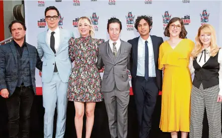  ?? — AP ?? The cast of The Big Bang Theory (from left) Galecki, Parsons, Cuoco, Helberg, Nayyar, Bialik and Rauch at the hand and footprint ceremony at the TCL Chinese Theatre in Hollywood on May 1.