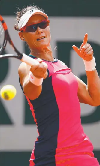  ?? END OF THE ROAD: Samantha Stosur plays a forehand during her fourth- round loss to Latvia’s Jelena Ostapenko ( Picture: GETTY IMAGES ?? right).