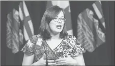  ?? CP PHOTO ?? Alberta Justice Minister Kathleen Ganley speaks during a news conference in Edmonton.