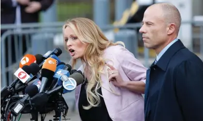  ?? Photograph: Eduardo Muñoz/AFP/Getty Images ?? Michael Avenatti with Stormy Daniels in 2018, when he was representi­ng her. He was convicted of cheating her out of proceeds from her book.