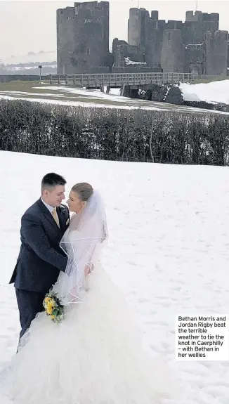  ??  ?? Bethan Morris and Jordan Rigby beat the terrible weather to tie the knot in Caerphilly – with Bethan in her wellies