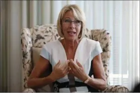  ?? JACQUELYN MARTIN — ASSOCIATED PRESS ?? Education Secretary Betsy DeVos is interviewe­d by The Associated Press in her office at the Education Department in Washington. It’s been six months since her bruising Senate confirmati­on battle, and DeVos remains highly divisive.