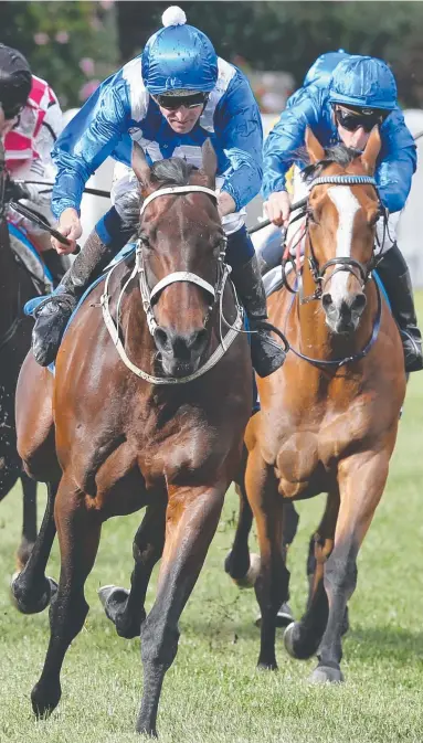  ?? Picture: DAVID CROSLING ?? The Chris Waller-trained Winx and Hugh Bowman leave the John O’Shea-trained Hartnell and James McDonald in their wake en route to a devastatin­g win in the Cox Plate at Moonee Valley yesterday