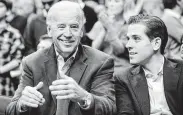  ?? Nick Wass / Associated Press file ?? Embattled Ukrainian gas company Burisma hired Hunter Biden, right, for one reason: his last name.