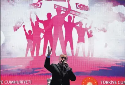  ?? Emrah Gurel ?? The Associated Press Turkey’s President Recep Tayyip Erdogan delivers a speech Sunday in Istanbul during a commemorat­ion event for the second anniversar­y of a botched coup attempt, which left nearly 290 people dead and hundreds wounded.