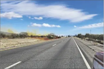  ?? ARIZONA DEPARTMENT OF PUBLIC SAFETY ?? THIS TUESDAY IMAGE PROVIDED by the Arizona Department of Public Safety shows an accident involving a commercial tanker truck caused a hazardous material to leak onto Interstate 10 outside Tucson, prompting state troopers to shut down traffic on the freeway.