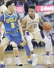  ?? Elaine Thompson Associated Press ?? THE BATTLE for national point-guard supremacy pitted Markelle Fultz against UCLA’s Lonzo Ball.