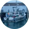  ??  ?? from top: Coauthors John Aldridge (left) and Anthony Sosinski; the Anna Mary at her slip at the town dock in Montauk (note the open stern).