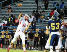  ?? BRITTANY CHAY — THE NEWS-HERALD ?? Mentor quarterbac­k Tadas Tatarunas throws last season at Euclid. Both area teams, as expected, remain in Division I, Region 1 this coming fall.