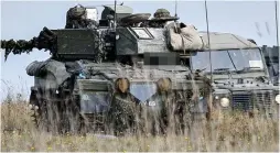  ?? ?? Tragedy: A tank on Salisbury Plain on Friday. Right, Jethro Watson-Pickering