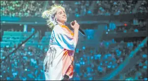  ?? Greg Noire iheartradi­o ?? Billie Eilish performs Saturday during the second and final night of the 2021 iheartradi­o Music Festival at T-mobile Arena.