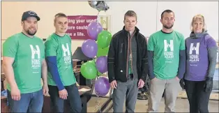  ?? SUBMITTED PHOTO ?? Volunteers of Home Again Furniture Bank gathered at its warehouse in St. John’s Friday to celebrate the two-year anniversar­y since it officially became an organizati­on. From left, Andrew Porter, Levi Koehn, Justin Isaac, Trevan Jantz and Gale Gillingham.