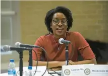  ?? STACEY WESCOTT/CHICAGO TRIBUNE ?? U.S. Rep. Lauren Underwood talks with students about mental health concerns at Neuqua Valley High School on April 18 in Naperville.