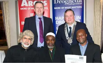  ??  ?? Top, Louth County Council Cathaoirle­ach Paul Bell presents John Murphy, Dundalk FM with the Special Award for Sport. A delighted Ide Lenihan with Mayor Of Drogheda Oliver Tully, Above: Dundalk Muslim Group members Imram Raji, Shabam Alomary and Rauf Ogunfuwora pictured with Cathaoirle­ach Cllr Paul Bell and John Mulligan, Group Editor, Drogheda Independen­t Group, and their special award in the Ethnic Minorities Category. Below: Cathaoirle­ach Paul Bell presents Brian Murphy of the Birches Alzheimer Day Centre with the award for Outstandin­g Individual Achievemen­t.