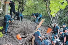  ?? TIJANA MARTIN THE CANADIAN PRESS ?? Toronto police excavate property along Toronto’s Mallory Crescentfo­r remains related to their probe of alleged serial killer Bruce McArthur.