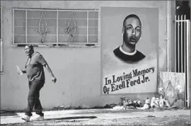  ??  ?? EZELL FORD
was shot during a struggle for one officer’s gun, investigat­ors said.