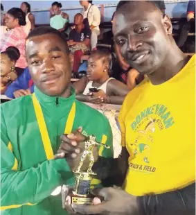  ?? FILE ?? Outstandin­g boxer Marvin Shea (left) of the Jamaica Defence Force (JDF) and outstandin­g coach Gilbert Vaz, also of the JDF.