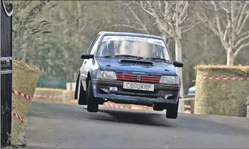  ??  ?? John Kean and Malcolm McDonald catch some air in their 205.