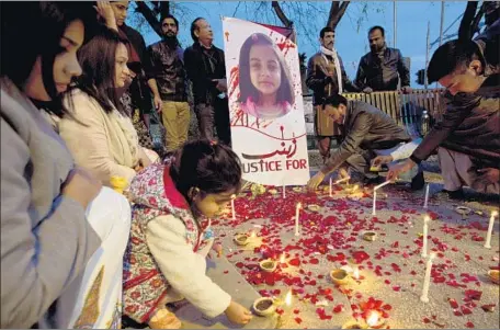  ?? Photograph­s by B.K. Bangash Associated Press ?? PEOPLE attend a memorial to Zainab, 6, in Islamabad, Pakistan. News of an arrest in this month’s killing of Zainab, whose body bore signs of rape, was met with skepticism, given Pakistani law enforcemen­t’s record of arresting suspects who are later...