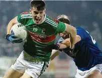  ??  ?? PULLING AWAY: Mayo’s James McCormack gets away from Niall Clerkin