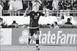  ?? Luis Sinco
Los Angeles Times ?? MEXICO defenseman Paul Aguilar celebrates after scoring his team’s final goal two minutes before the players would have gone to penalty kicks,