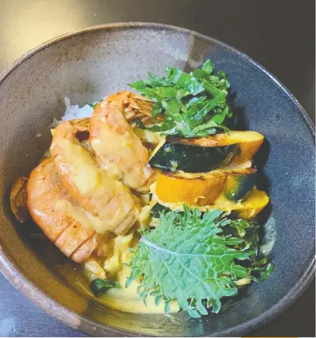  ??  ?? Try matching chef TJ Conwi's coconut adobo prawns with a fruity-style Pinot Gris, Anthony Gismondi suggests.