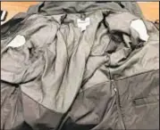  ?? OFFICIAL COURT EVIDENCE ?? Lining of American Airlines mechanic Paul Bellosi’s jacket was cut to make room for bricks of cocaine flown in from Jamaica, federal prosecutor­s say.