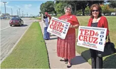  ?? STEWART F. HOUSE, GETTY IMAGES ?? Maggie Wright, left, and Suzanne Blackstone show support for Ted Cruz outside the Plano candidate forum Sunday.