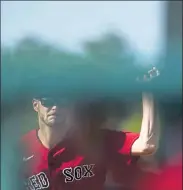  ?? AP FILE ?? Red Sox lefty Chris Sale practices throwing during spring training on Monday in Fort Myers.