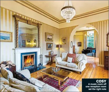  ??  ?? COSY A music room off one reception room set the right note