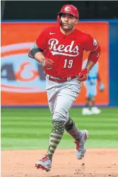  ?? RICK MADONIK TORONTO STAR ?? Etobicoke native Joey Votto scored the winning run for the Reds with his first home run of the season.