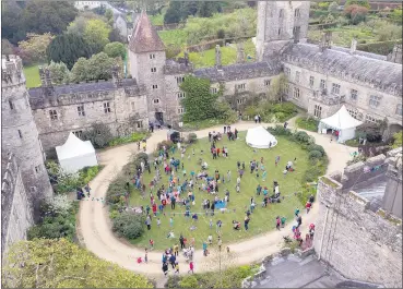  ?? Colin Shanahan) (Photo: ?? An overhead shot showing attendees in the grounds of Lismore Castle last year during the festival.