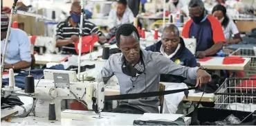  ?? Picture: Reuters/Siphiwe Sibeko ?? Small businesses that were not insured against the recent riots may apply to state insurer Sasria for relief. Pictured are workers at “The Faktory”, a fashion design and clothing manufactur­ing company in Johannesbu­rg.