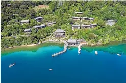  ?? BROOK SABIN/STUFF ?? From top: IndoKiwi, an offgrid glamping escape on the West Coast, is completely private; left, the Marlboroug­h Sounds’ Bay of Many Coves has a series of luxury apartments tucked away in native bush.