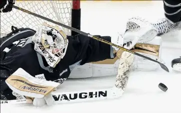 ?? Peter Diana/Post-Gazette photos ?? Matt Murray makes a save during Wednesday’s camp session at at Consol Energy Center.