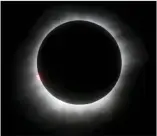  ?? AP PHOTO/FILE ?? This March 9, 2016, file photo shows a total solar eclipse in Belitung, Indonesia. A solar eclipse on Aug. 21 is set to star in several special broadcasts on TV and online. PBS, ABC, NBC, NASA Television and the Science Channel are among the outlets...