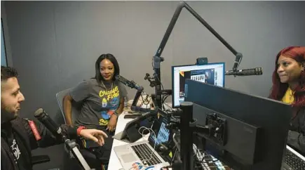  ?? E. JASON WAMBSGANS/CHICAGO TRIBUNE ?? Genesis Bencivenga, owner of Lorenzo’s Frozen Pudding, center, was a guest Sept. 30 on the Midday Live Show with Steve Micheas and Jasmine Bennett.