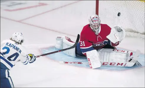  ?? —CP ?? Leafs forward Kasperi Kapanen scores on Habs goalie Carey Price during pre-season play in Montreal last night.