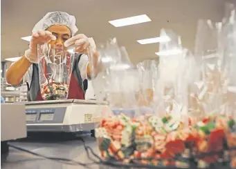  ?? Leah Millis, Denver Post file ?? See how candy is made at Hammond’s Candies.