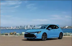  ?? JAMES HALFACRE/ TOYOTA/TNS ?? The 2019 Corolla Hatchback’s looks promise more than Toyota’s usual sensible shuttle.