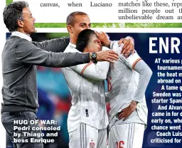  ??  ?? HUG OF WAR: Pedri consoled by Thiago and boss Enrique