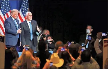  ?? Ap-travis Dove ?? President Donald Trump and Vice President Mike Pence give a thumbs up after speaking during the first day of the Republican National Convention in Charlotte, N.C.