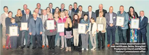  ??  ?? The various award winners with their certificat­es. Below, Strangford Presbyteri­an Church and Belfast
Harbour Commission­ers office