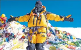  ??  ?? AMAZING FEAT: Ms Hughes reached the peak of the world’s highest mountain in 2012.