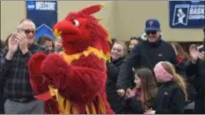  ?? PETE BANNAN - MEDIANEWS GROUP ?? While most students are on spring break, fans, staff and Phineas the Phoenix, the Swarthmore College mascot, cheered the players as they finished practice at LambMiller Field House on Wednesday.