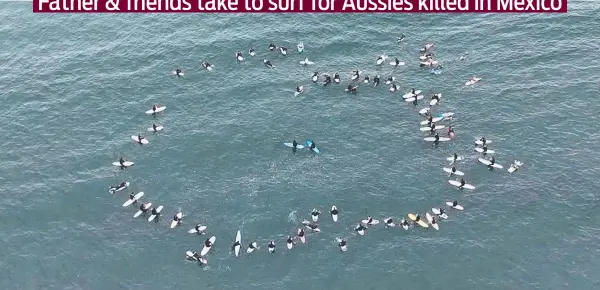  ?? Picture: Nine ?? Perth father Martin Robinson was among the dozens who took part in a paddle out in San Diego in honour of his slain sons Callum and Jake.