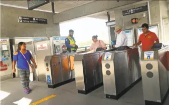  ?? Scott Strazzante / The Chronicle ?? BART riders leave the Pittsburg Center Station. Suburban directors urge more enforcemen­t.