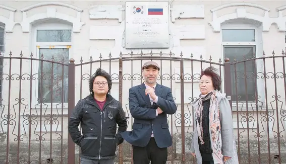  ?? Courtesy of K-Value Creators ?? Giuseppe Kim, center, art director and composer of the musical “Pechka,” visited Ussuriysk, Russia, to look for historic records of Choe’s independen­ce activities in Russian territory.