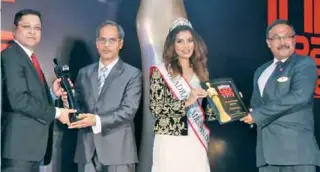  ??  ?? The award was given to Ramee Grand Hotel & Spa, Pune and received by its Director Operations & Business Developmen­t (India) Nihit Srivastava